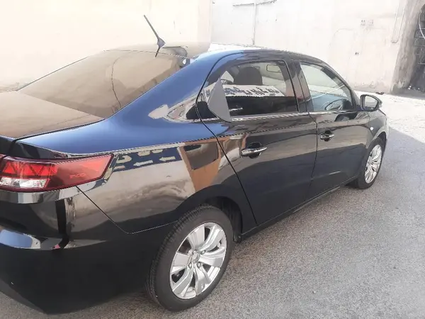 نمای 3 از خرید تارا، اتوماتیک V2، اتوماتیک، مدل 1402 مدل 1402 رنگ مشکی / داخل مشکی نقدی و اقساطی در خودروشاپ نمای 3 از خرید تارا، اتوماتیک V2، اتوماتیک، مدل 1402 مدل 1402 رنگ مشکی / داخل مشکی نقدی و اقساطی در خودروشاپ
